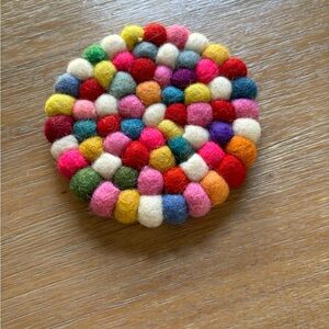 Multi color, fun soft ball drink coaster. Hand made